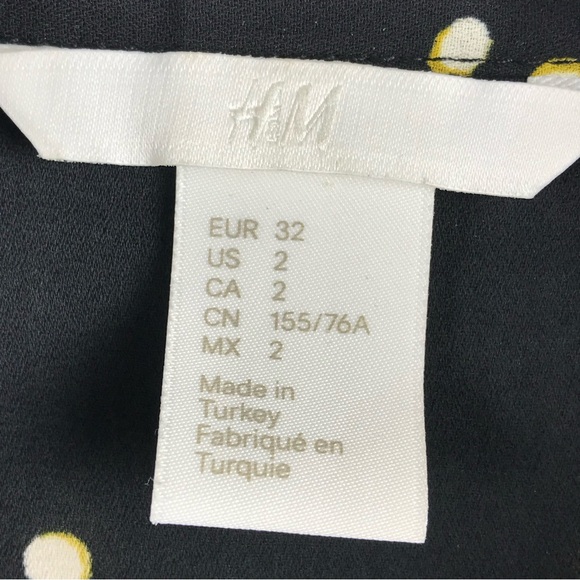 H&M size 2 black semi sheer Straight-cut blouse with a printed pattern. - Picture 7 of 9